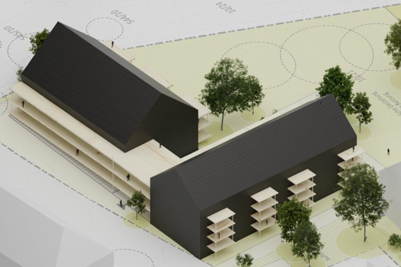 Mehrstöckiges Wohngebäude mit Grünfläche und Straßenbeschilderung im Vordergrund.